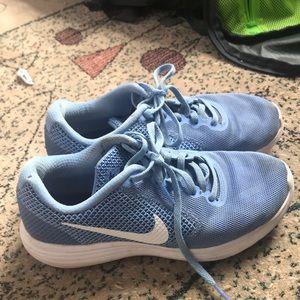 Blue Nike Revolution 3 shoes